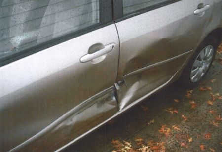 sideswipe damage to car from accident