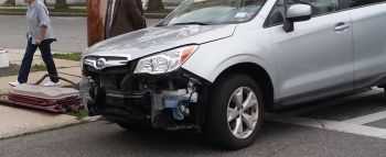 Damage on the silver SUV which ran a stop sign