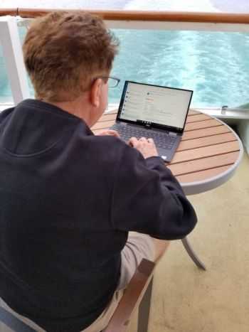 working on cruise ship balcony