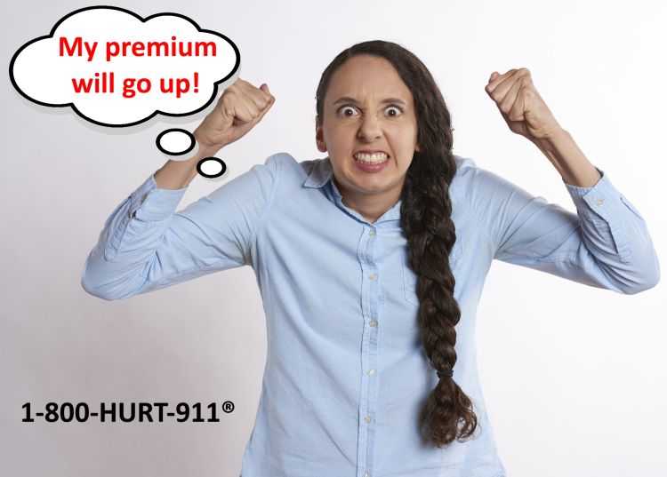 An image of a woman clenching her fists and grimacing with her eyes wide open, worried about making a claim on her collision coverage. She's asking, "Will My Insurance Premium Go Up if I File a Claim Against My Own Insurance?" The image shows the 1-800-HURT-911® trademark.